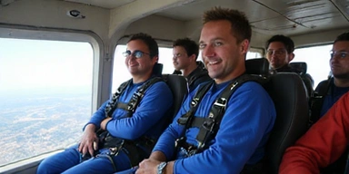 Group of skydivers in a plane