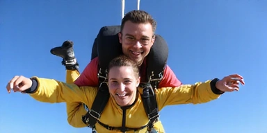 Tandem skydiver smiling